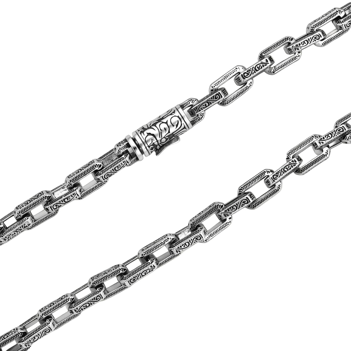 Silver 316L stainless steel rectangular link chain necklace with intricate scroll engravings, 560mm length, 7.1mm width.
