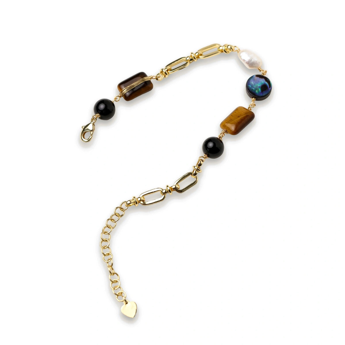 Gold chain bracelet with tiger's eye, obsidian, pearl, and iridescent abalone stones on cream background.