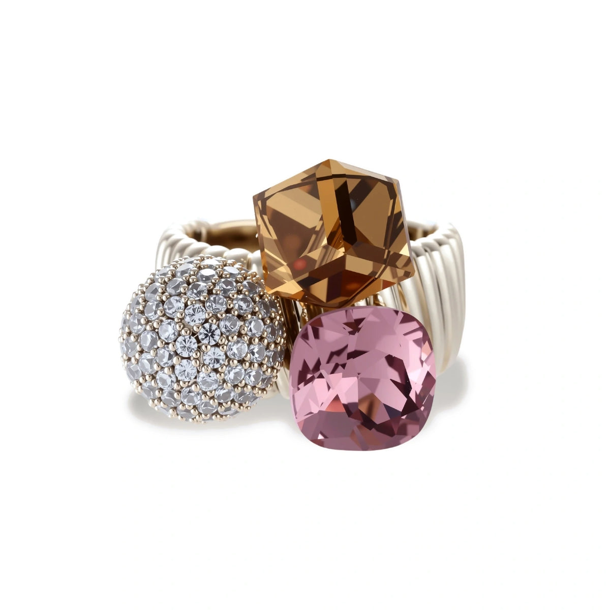Bold adjustable ring featuring pink crystal, amber square stone, and crystal pavé sphere on coffee gold plated copper band.
