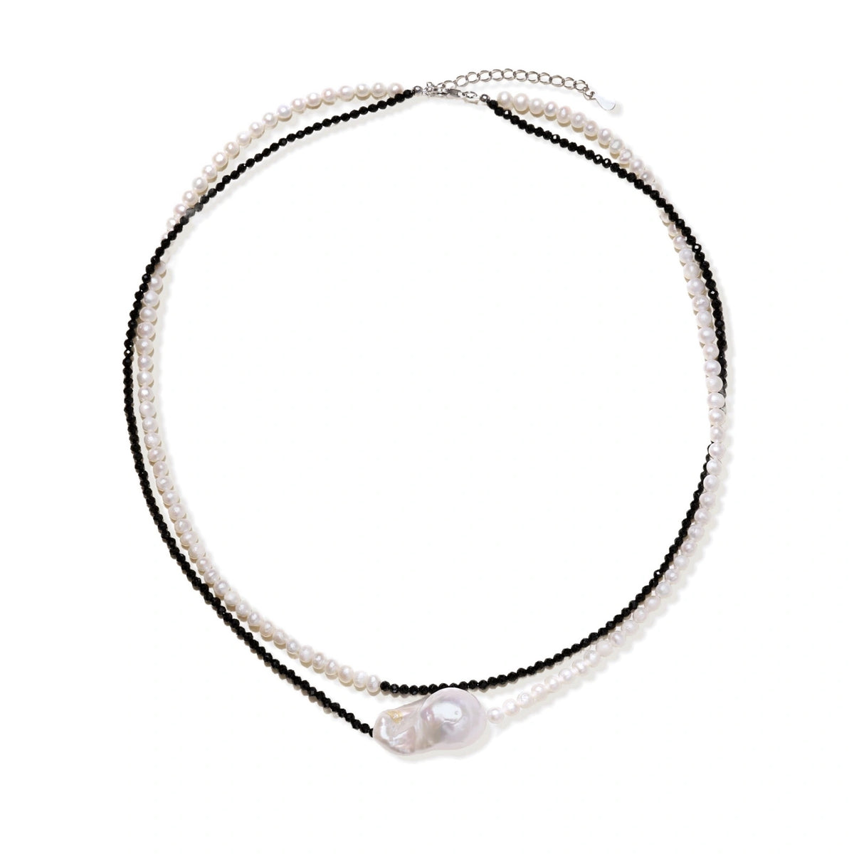 Double-strand necklace with black faceted quartz and white pearls featuring an oversized baroque pearl centerpiece