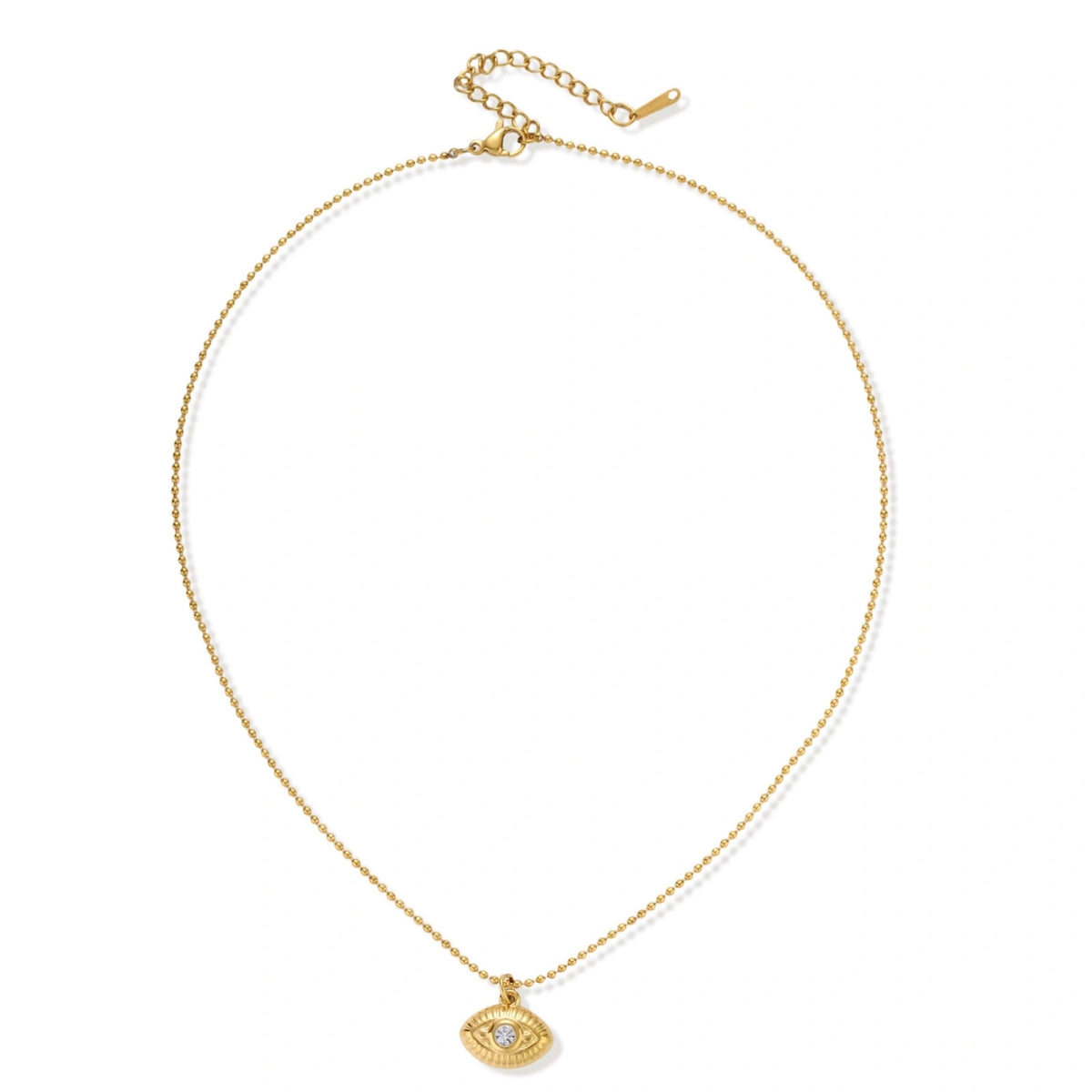 Layered necklace with green stone beads, gold spacers, white accents, and protective eye pendant on cream background.