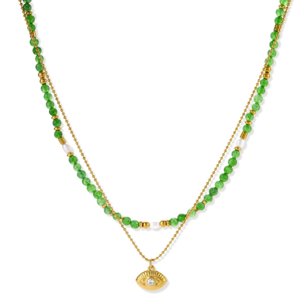 Layered necklace with green stone beads, gold spacers, white accents, and protective eye pendant on cream background.