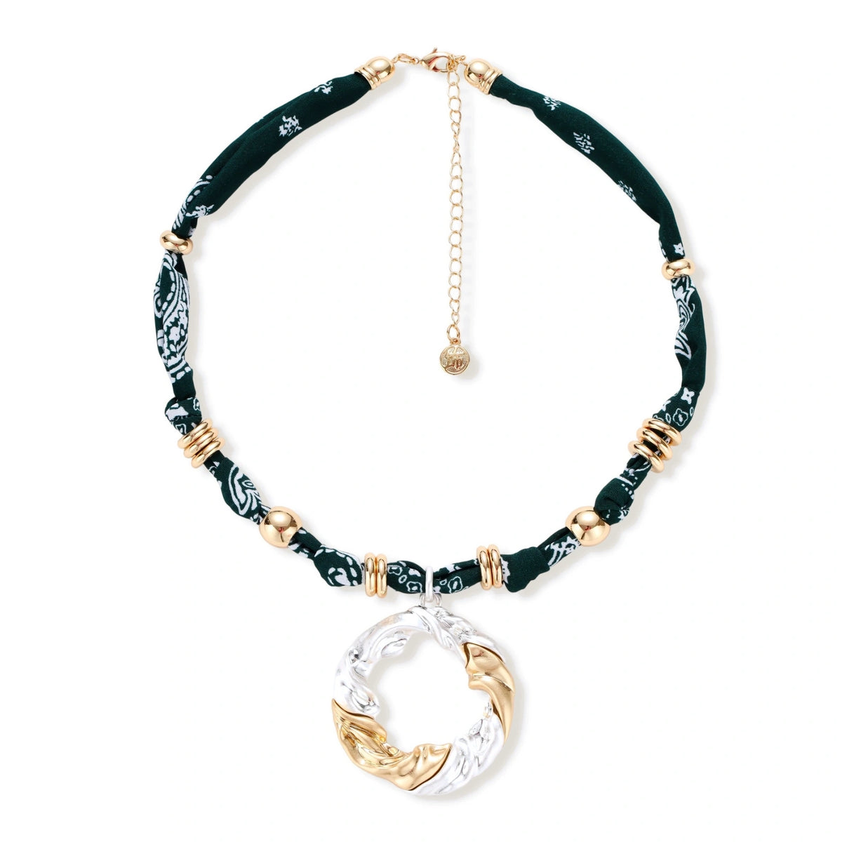 Adjustable necklace with black paisley fabric cord, gold metal spacers, and clear twisted pendant on cream background