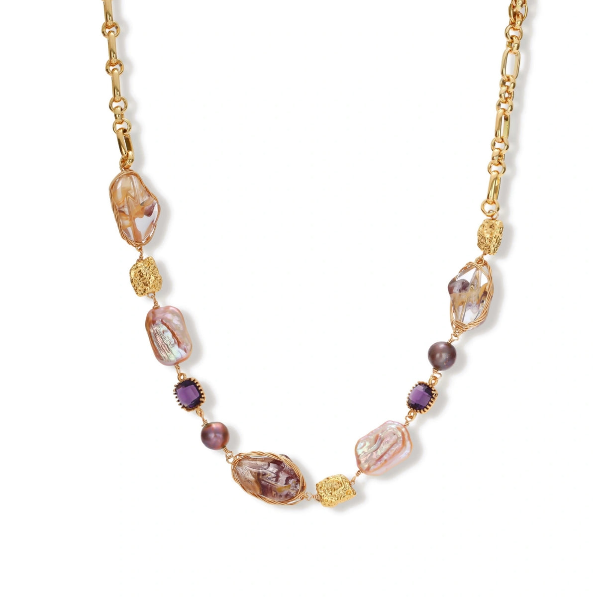 Gold-plated necklace with baroque pearls, purple amethyst stones, and wire-wrapped details on white background.