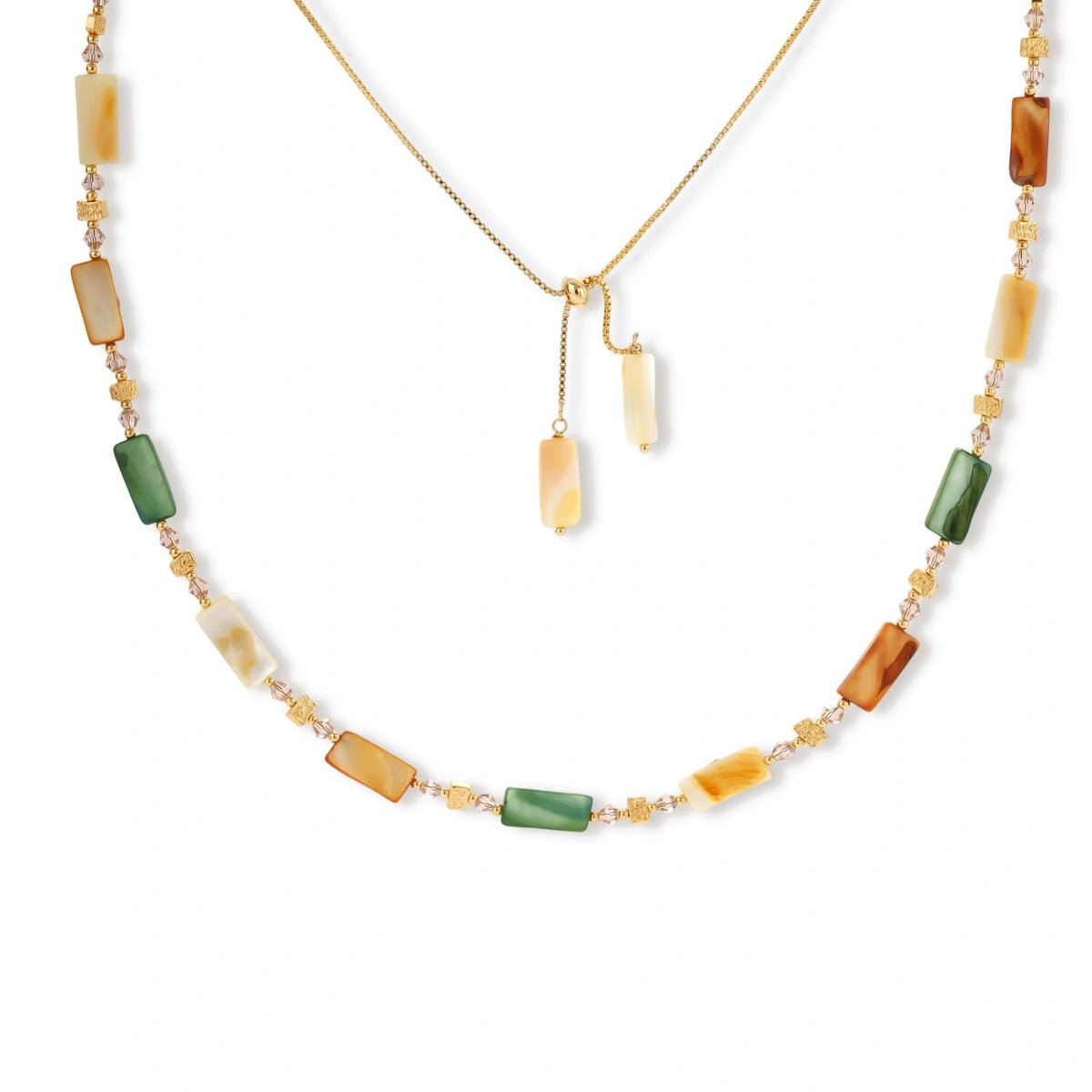 Adjustable gold-plated necklace with natural shell beads in green, amber, and cream tones on neutral background.