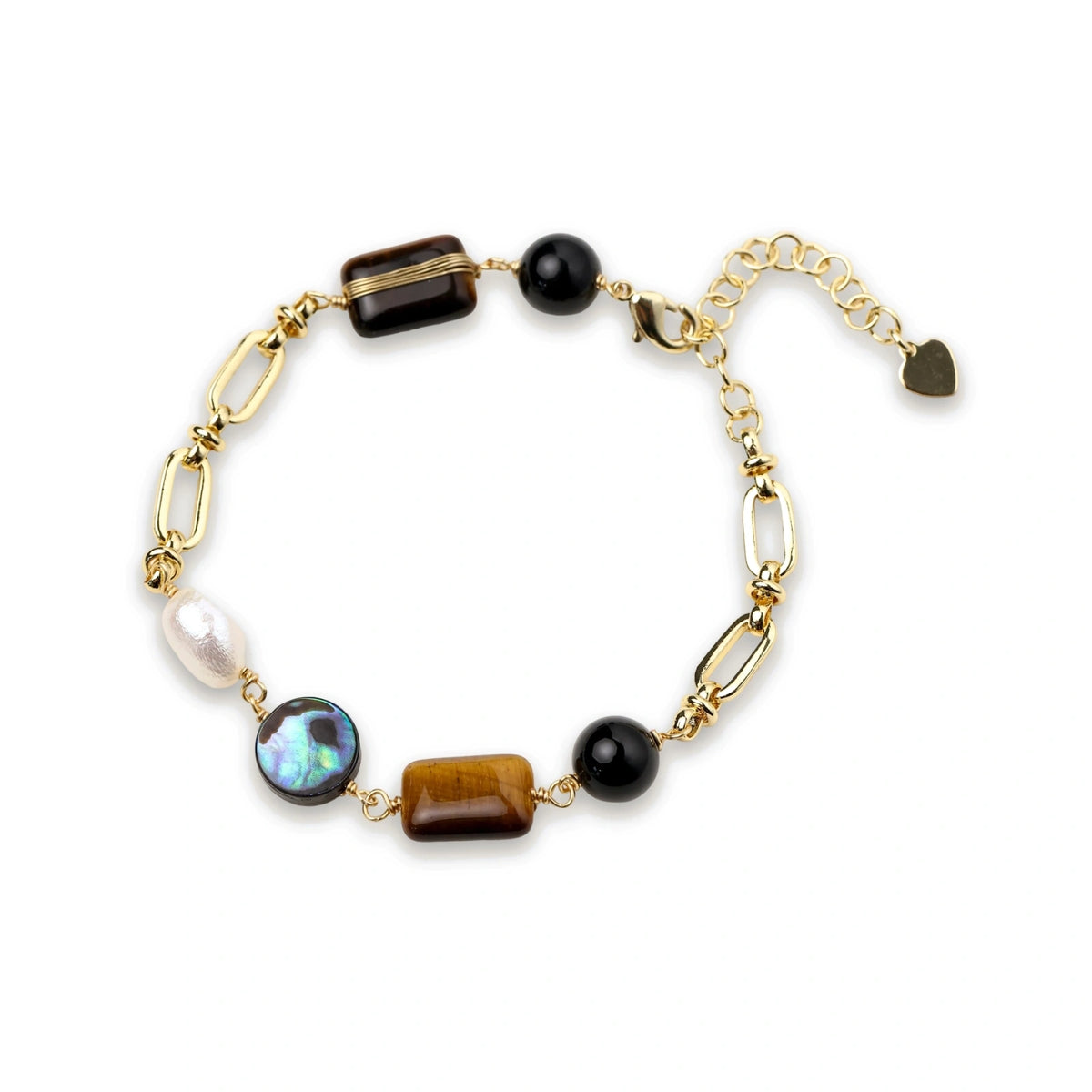Gold chain bracelet with tiger's eye, obsidian, pearl, and iridescent abalone stones on cream background.